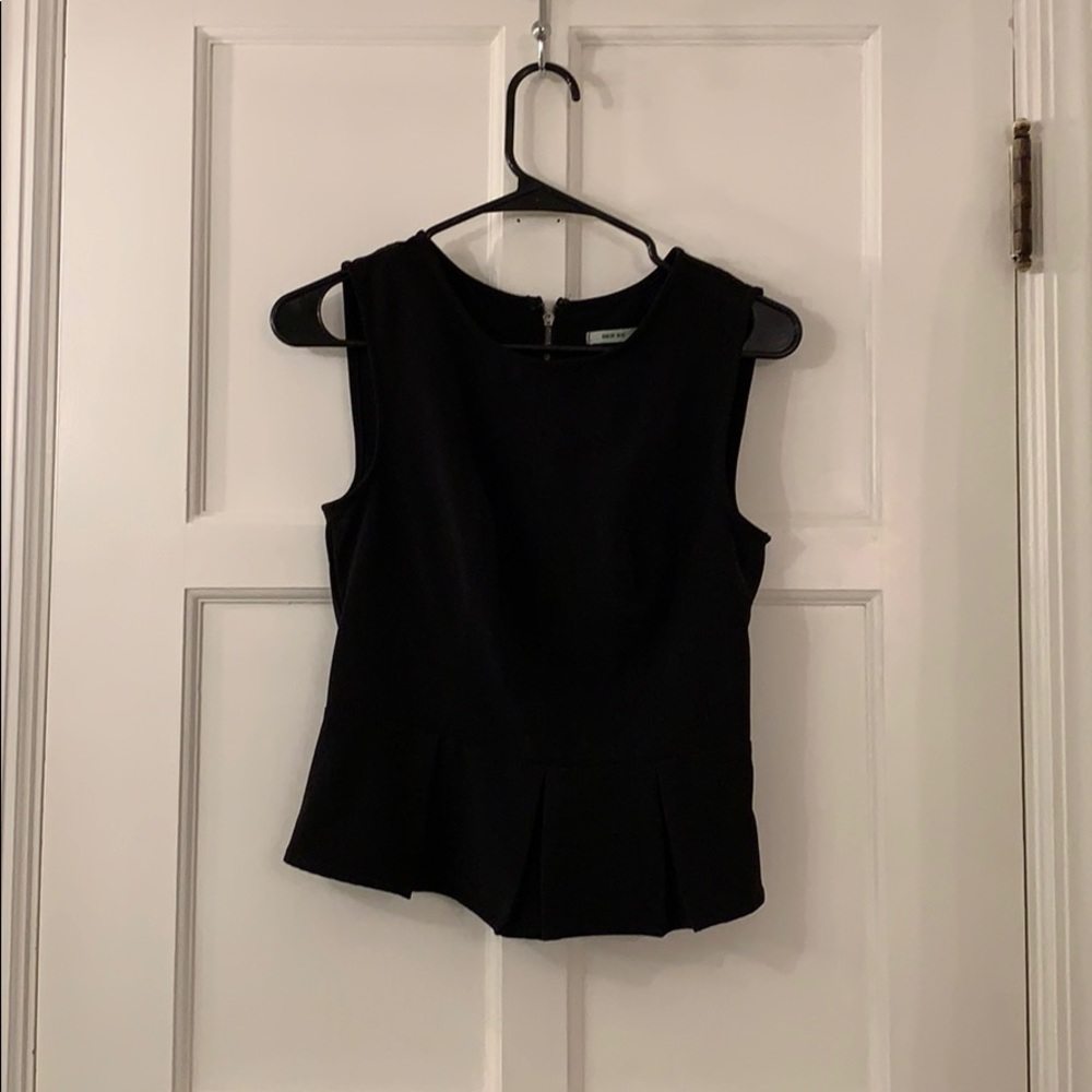 Black sleeveless peplum top